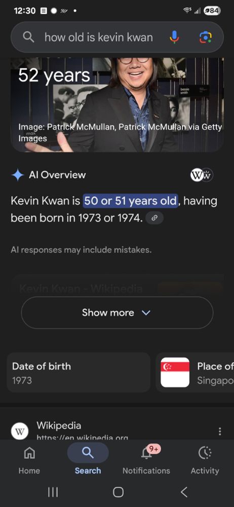 A screenshot of an AI answer to the question how old is Kevin Kwan? It says he is 50 or 51 y3ars old having been born in 1973 or 1974. Then below that it says hos date of birth is 1973.