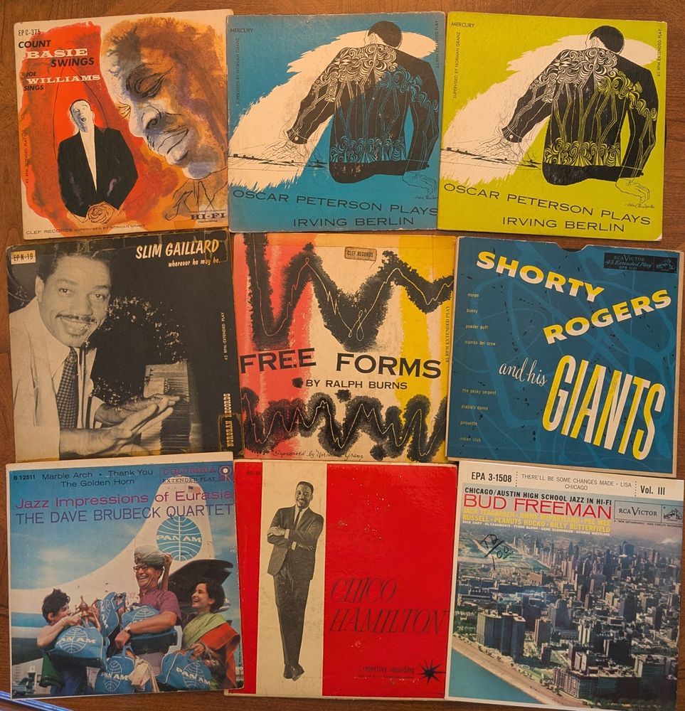 Photo of nine jazz EPs from the 1950s including Oscar Peterson on Mercury with David Stone Martin covers, a couple on Clef Records, Dave Brubeck, and Shorty Rogers and his Giants with Art Pepper (but credited to Art Salt because of contractual issues).