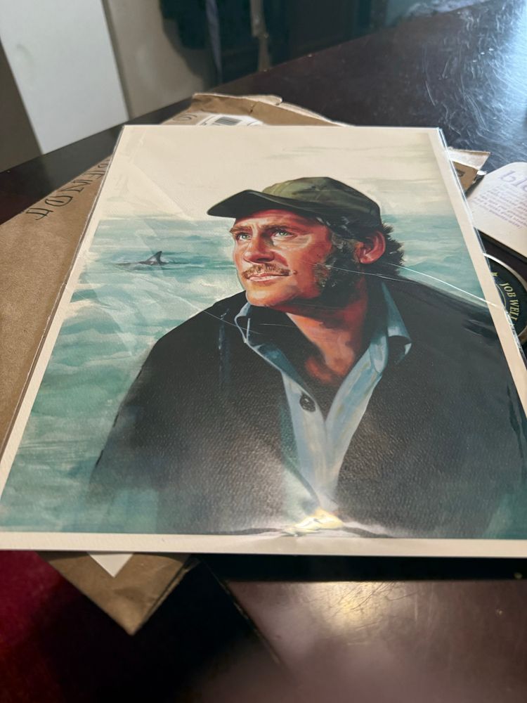A beautiful print of artwork of Quint from “Jaws”