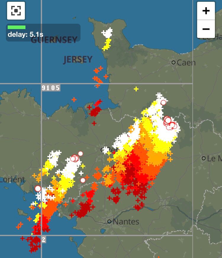 The background is a map of the Pays de là Loire (mid western France), on which is superimposed a mass of dots (representing lightning strikes). Red dots are the oldest, through orange and yellow, to white, which show the currently active zone, which stretches approximately 80 miles from Rennes to the north east. There is also a smaller (but still huge) storm over the southern coast of Brittany).
