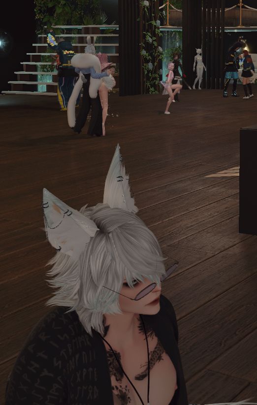 oc auri sitting far from dia and pups, who are dancing together