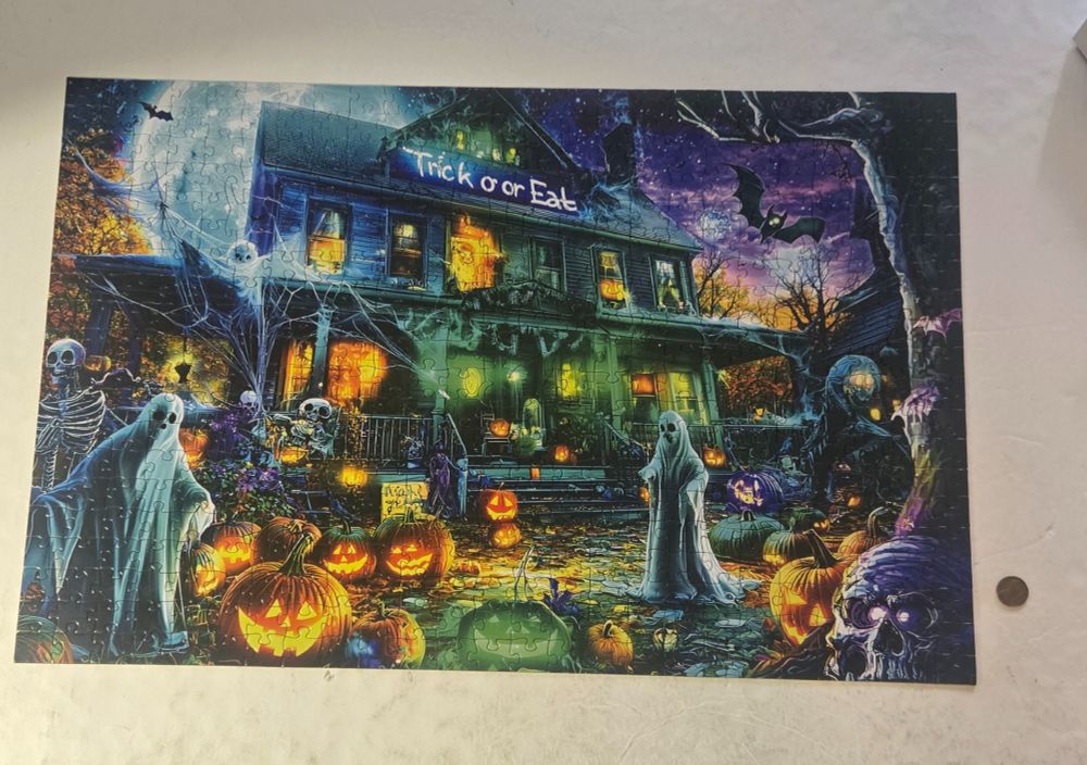 An ugly AI jigsaw puzzle of a spooky house 