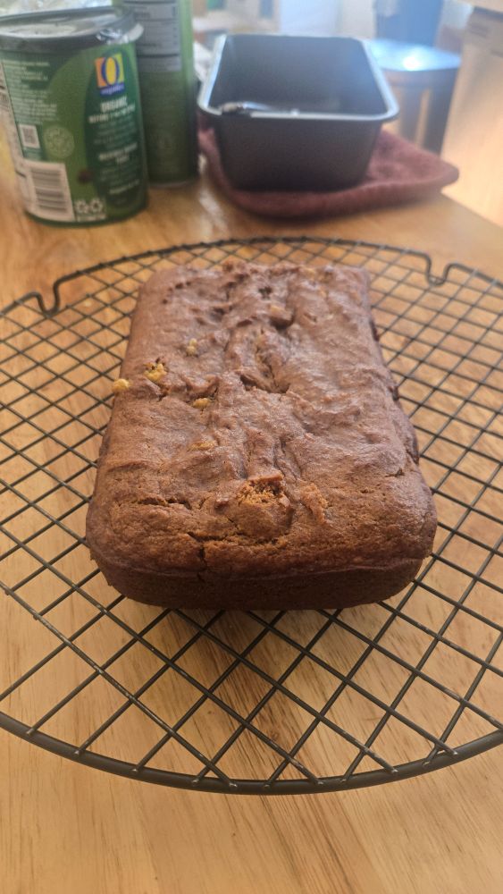 A banana bread on a cooling rack 