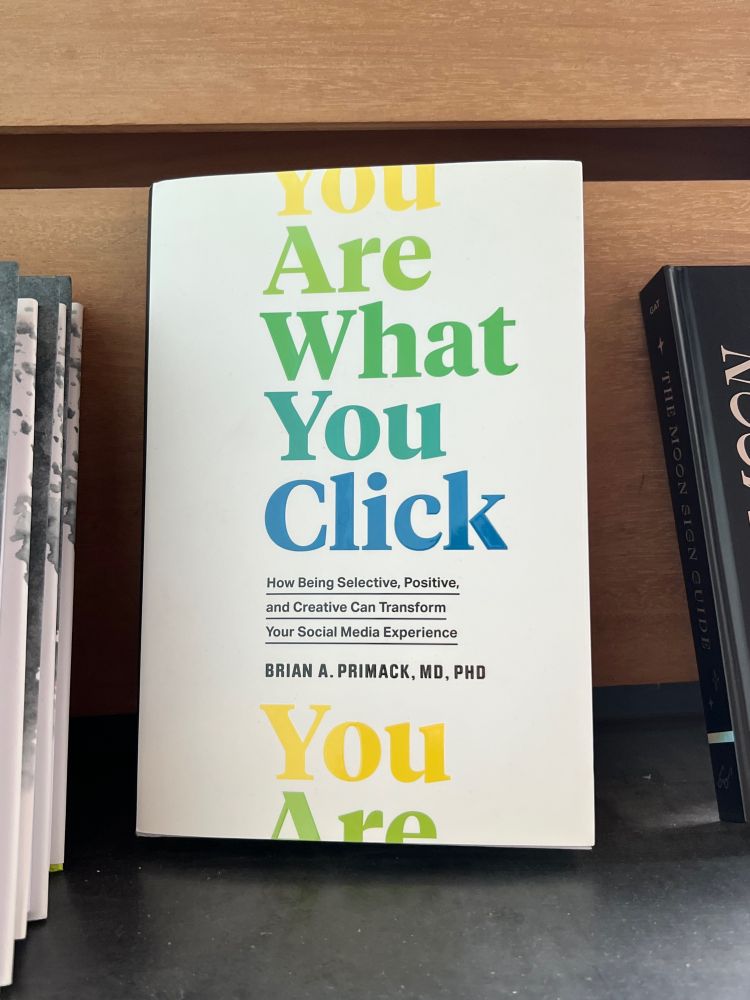 Book on a shelf titled: you are what you click