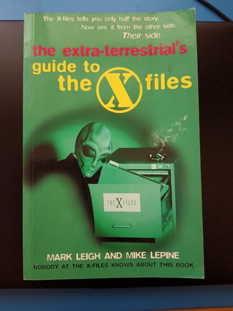 Cover of Mark Leigh and Mike Lepine's humorous book the Extra-terrestrial's guide to the X files.