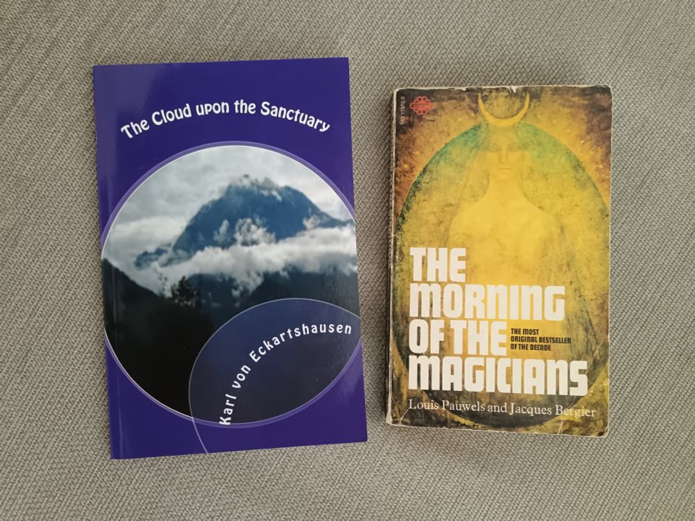 Picture of two books, The Cloud upon the Sanctuary and The Morning of the Magicians.