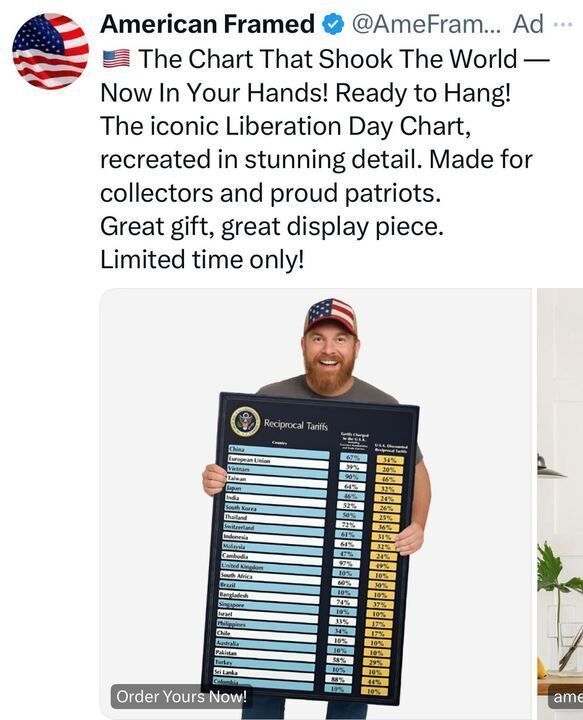 A sponsored ad from “American Framed.” The text advertises a “Liberation Day Chart” as a collectible patriotic display piece. Below is a man holding a very large printed chart labeled “Reciprocal Tariffs,” listing countries and tariff percentages. The man is smiling and wearing a hat with an American flag design.