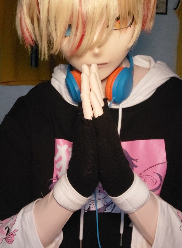A kigurumi praying