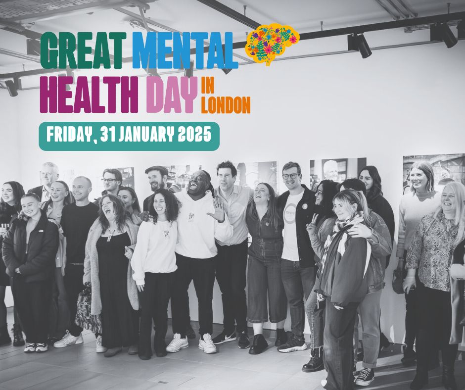 A group photo taken at City Lit gallery. The group look happy and celebratory being together.