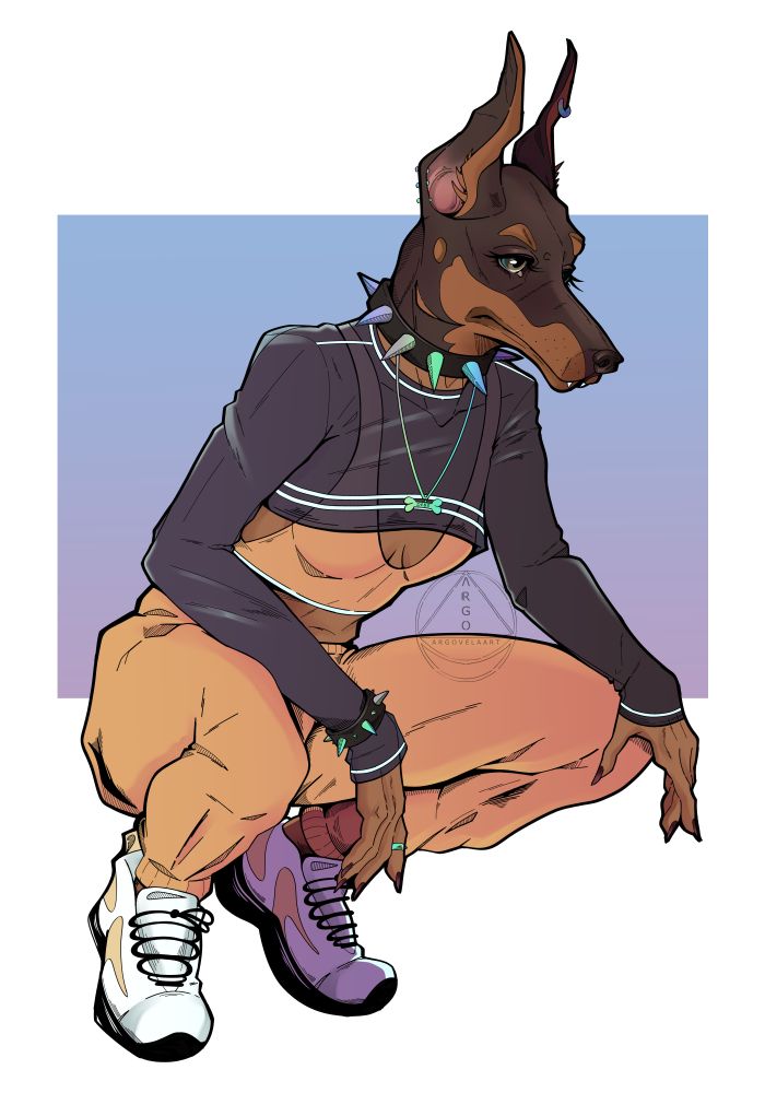 A woman is posed crouching down in a squat position with her elbows resting on her knees. Her head is that of a Doberman dog instead of a human, and has several piercings in her long ears. She wears a black spiked collar and bracelet while her clothes are sporty. She wears a cropped yellow sports bra with a sheer black long sleeved short over the top, a pair of yellow tracksuit pants and white trainers.