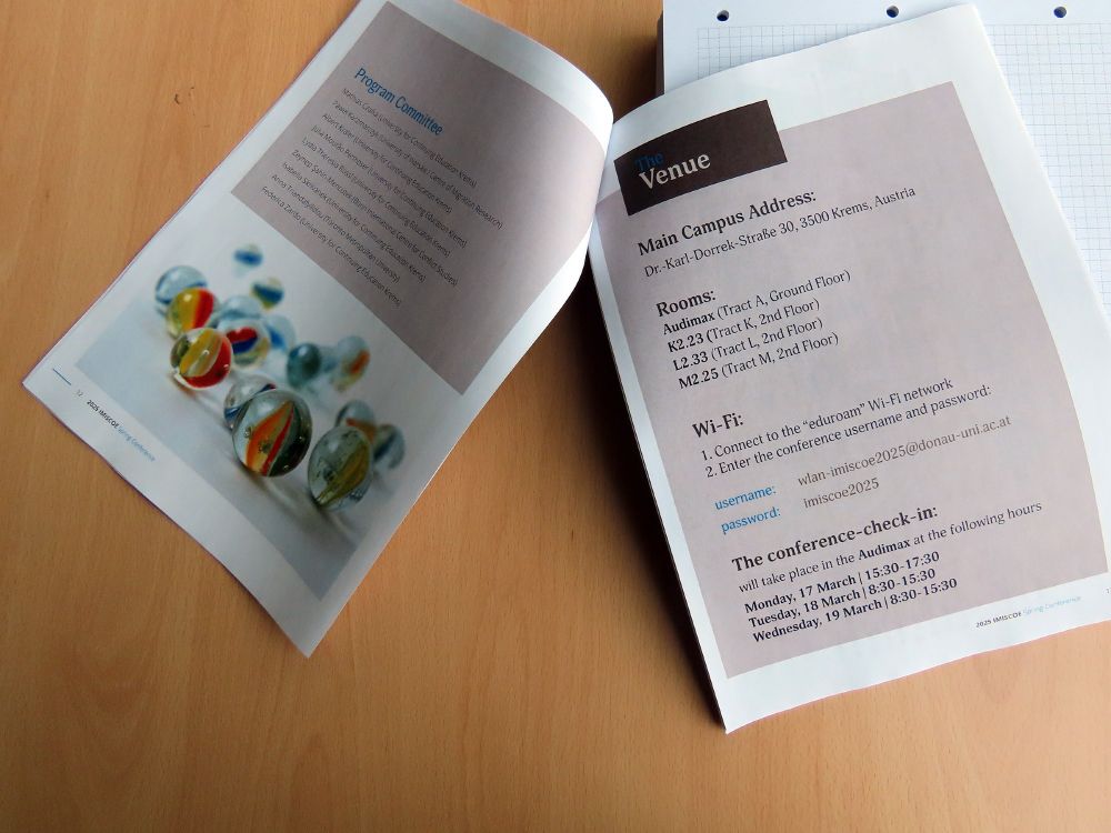 A close-up of the conference booklet