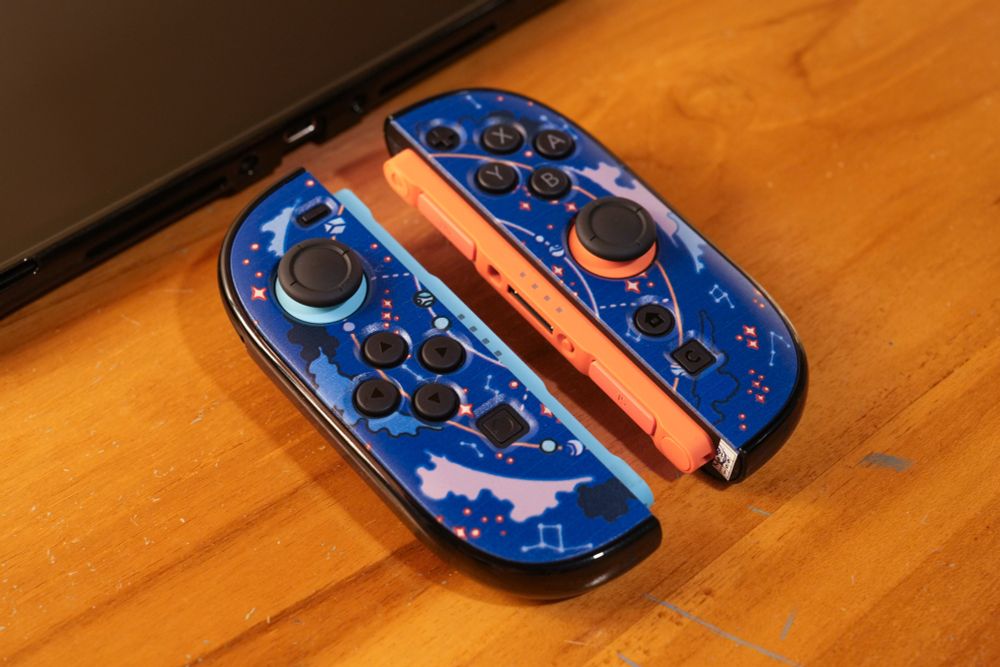 Switch 2 joycons with hard case with moon and stars print. 
