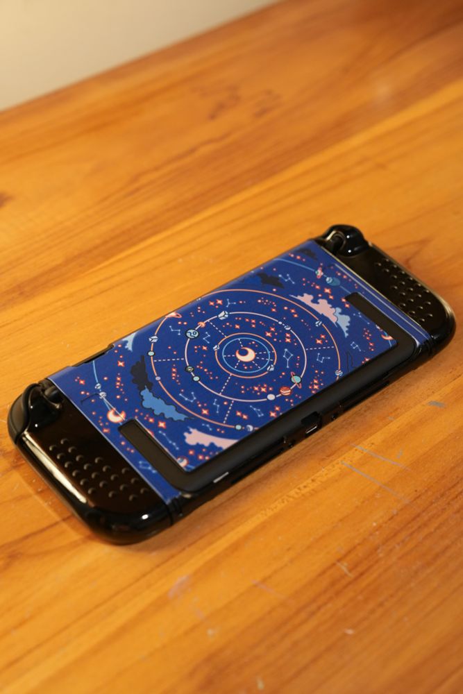 Switch 2 with hard case with moon and stars print. 