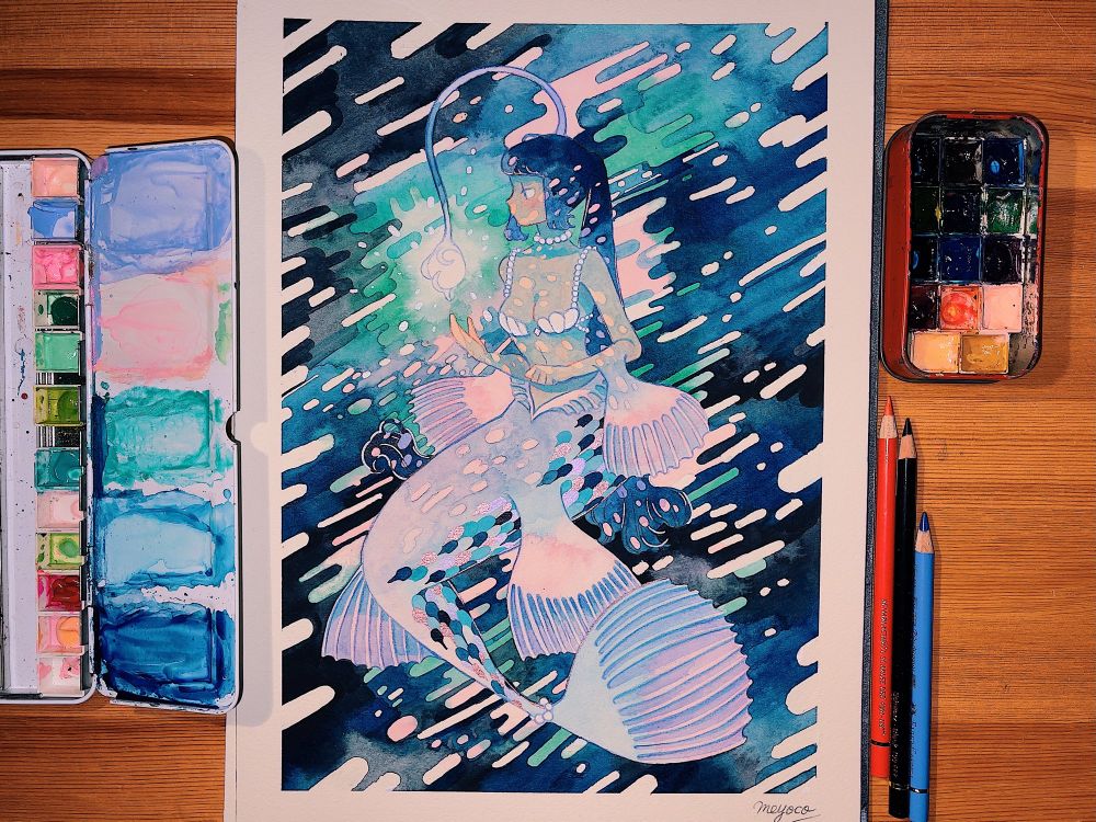 A painting of a pink mermaid with long dark hair and anglerfish bulb from her head. Around the painting, there are three pencils and two palettes. 