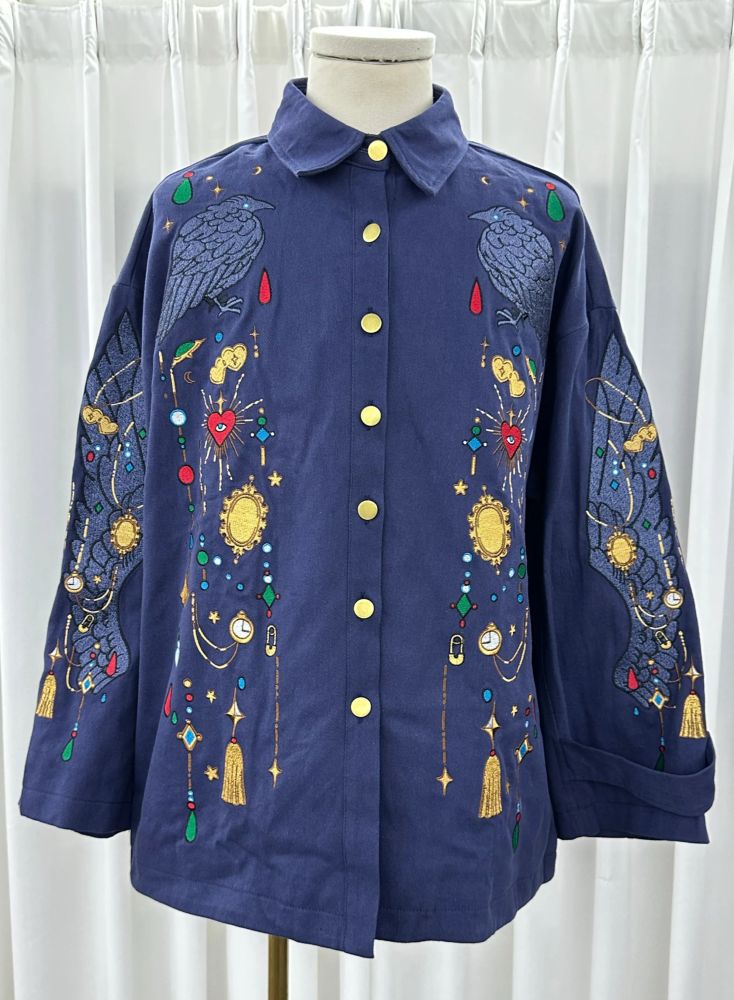 Blue jacket with crow and jewels embroideries on the front and sleeves. 