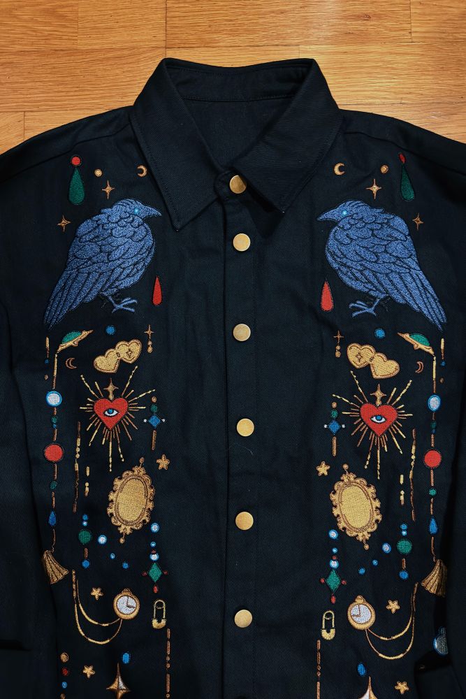 Black jacket with crow and jewels embroideries on the front