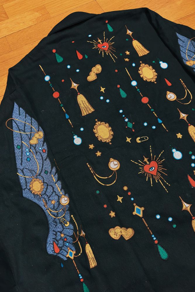 Black jacket with crow wing and jewels embroideries 