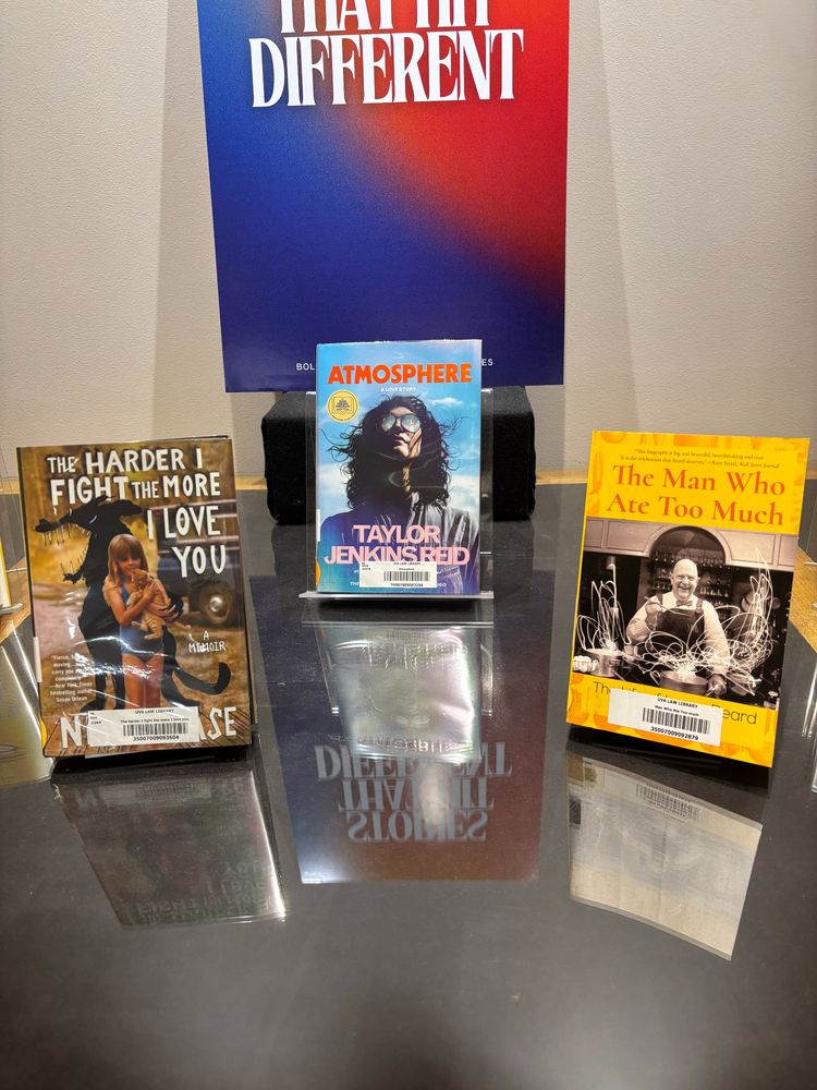 Three books. The Harder I Fight the More I Love You by Neko Case, Atmosphere by Taylor Jenkins Reid, and The Man Who Ate Too Much: The Life of James Beard by John Birdsall.