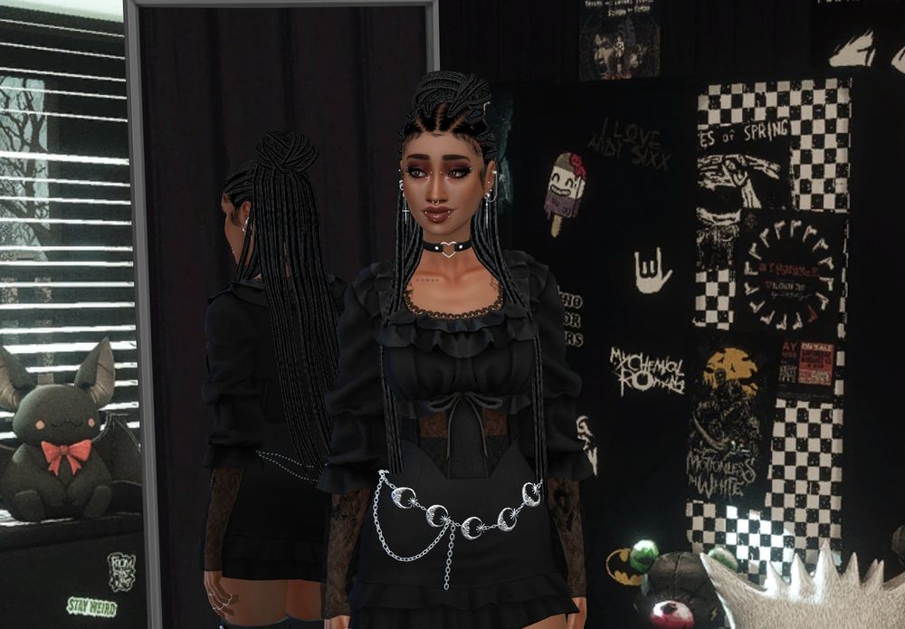 Screenshot from Sims 4 showing a beautiful young woman with goth style 