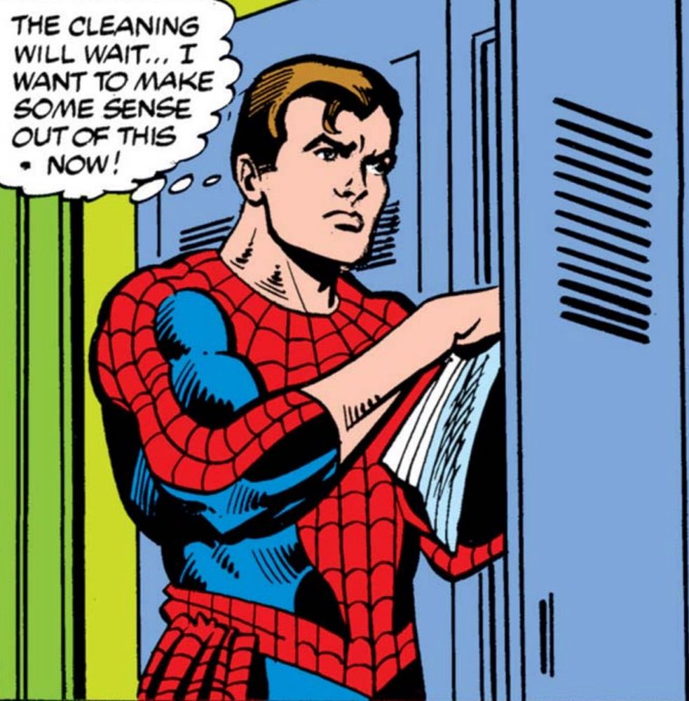 Spider-Man, unmasked, puts things away in a locker 