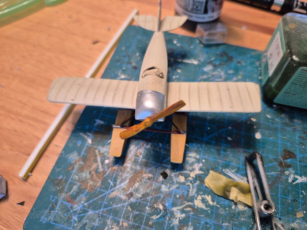 Sopwith Schneider floatplane, now with propeller and sitting on floats. No upper wing mounted yet. That's the difficult part!