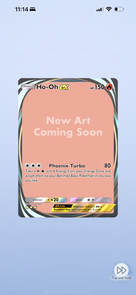 Pokemon TCGP screenshot of the new Ho-Oh ex immersive card but instead of artwork of Ho-oh the card is a peach color and says "New Art Coming Soon." The art was removed from the game on launch night due to a plagiarism issue.