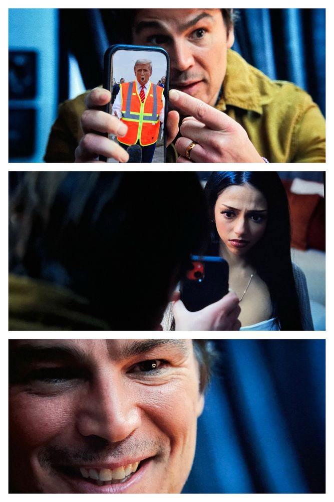 In stills from the film Trap, a psycho killer played by Josh Hartnett shows his phone screen — doctored from the original scene to show Donald Trump campaigning while dressed like a garbage man — to a pop singer played by Saleka Night Shyamalan, who looks at it in horror. The psycho smiles maniacally. 