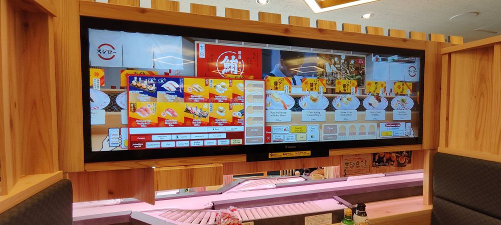 Grand écran pour commander des sushis 