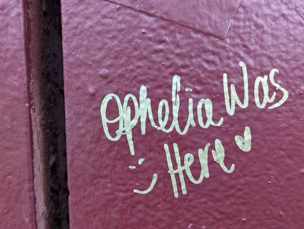 Ophelia was here partially in cursive on a bridge in Chicago 