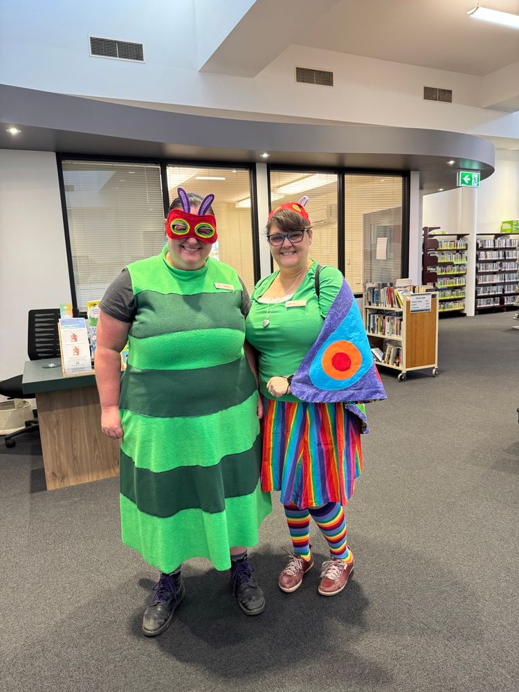Two librarians. Dressed as the ‘Very Hungry Caterpillar’ and the butterfly 