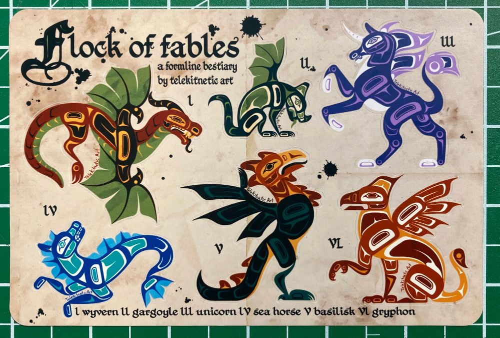 A picture of a 4 x 6 inch sticker sheet. The sheet design has a worn paper texture to it, and has several ink and stain marks on it. The sticker designs consist of six mythical medieval monsters in formline design; a wyvern, a gargoyle, a unicorn, a sea horse, a basilisk, and a gryphon.