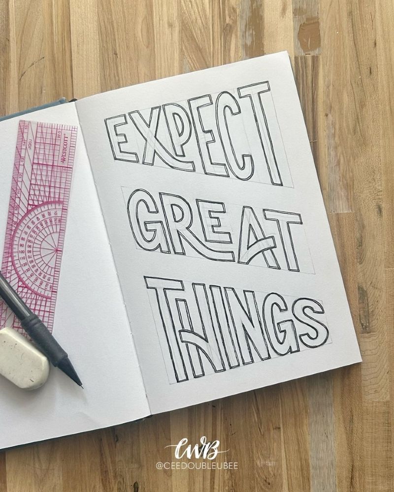 Minimalist but bold block lettering that reads "Expect Great Things"