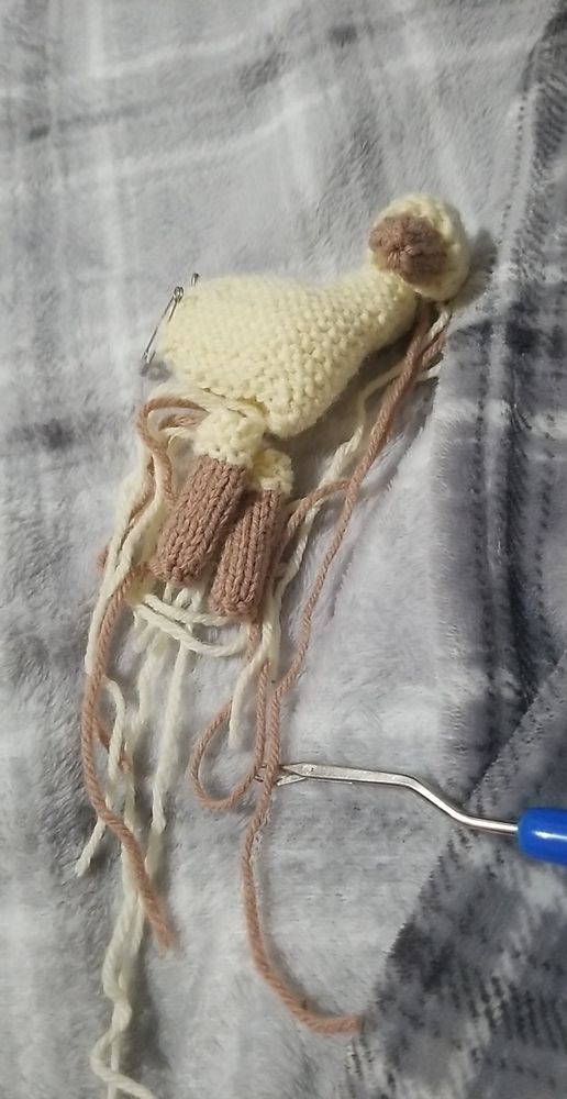 Off-white and brown knit llama doll
Work in progress
