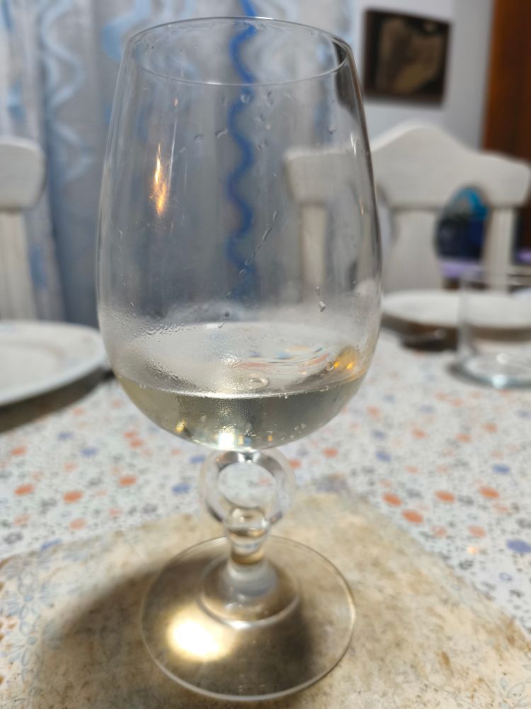 A glass of (mostly drunk) Prosecco 