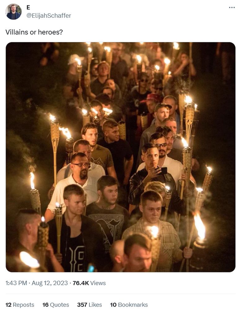 Aug. 12, 2023 tweet by Elijah Schaffer with a photo of torch carrying Neo-Nazis from their UVA march. Schaffer wrote:

"Villains or heroes?"