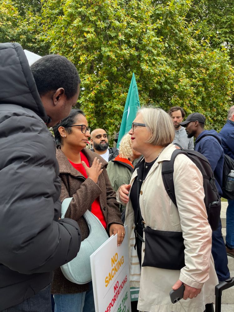 Saying goodbye to workers before rushing to city hall. 