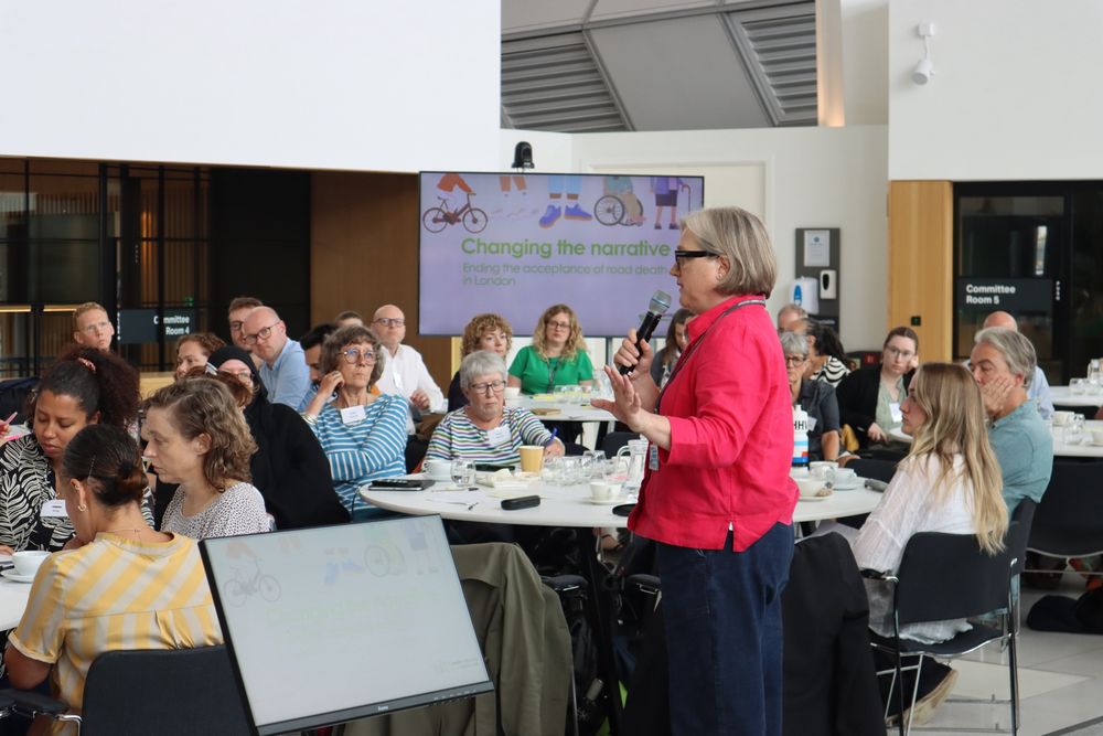 Caroline collecting feedback from attendees at Changing the Narrative ending the acceptance of road death in London event after discussing ideas to feed into TfL’s Vision Zero Action Plan 2. 