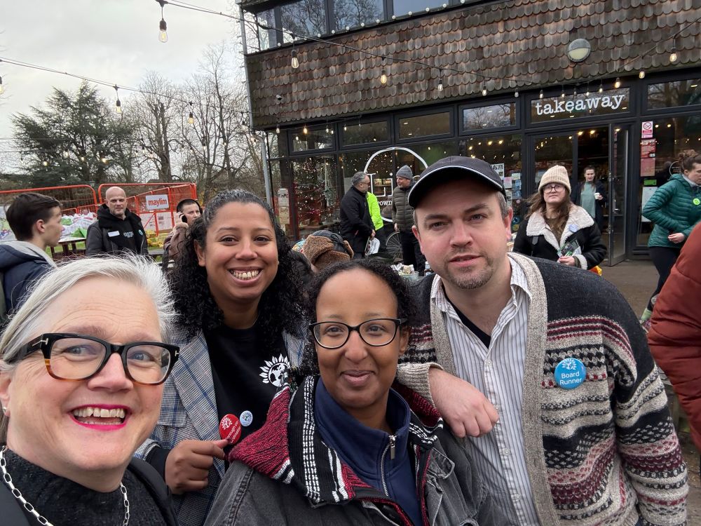 Smiling team of candidates with Caroline