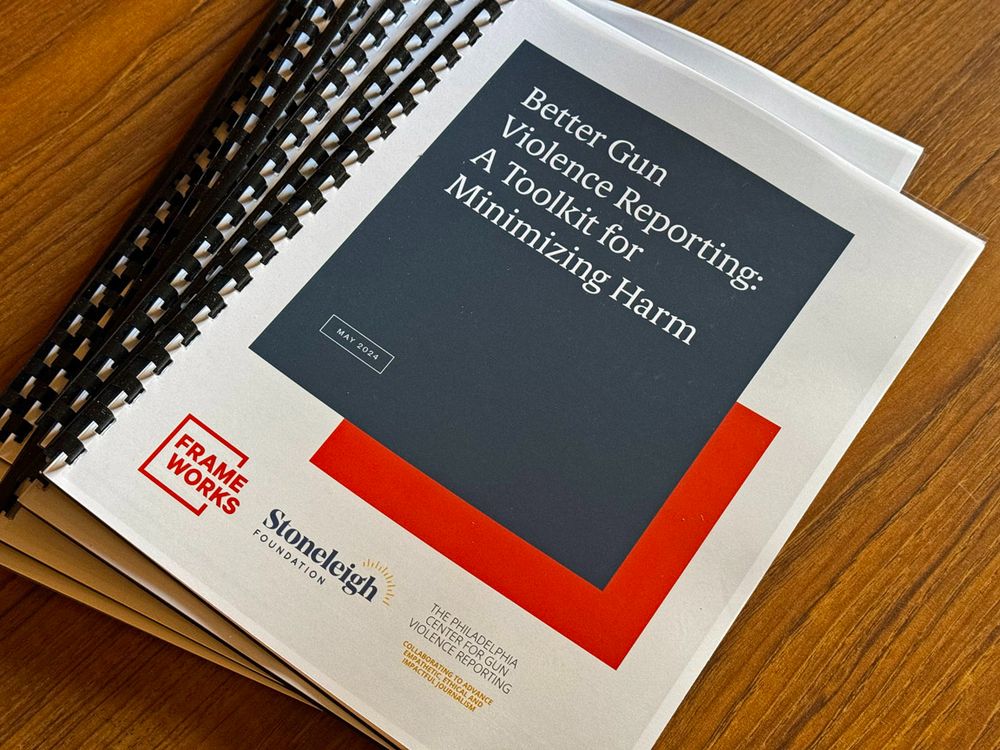 Photo shows a small stack of our guidebooks: "Better Gun Violence Reporting: A Toolkit for Minimizing Harm"