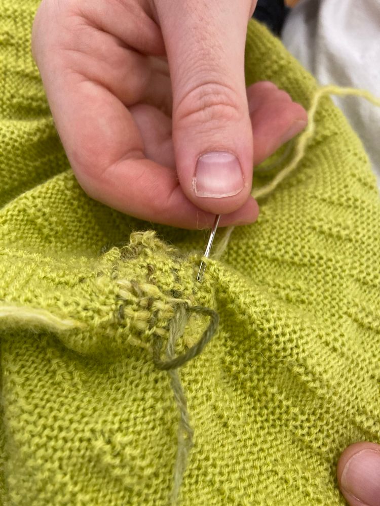 Mostly darned green sweater 