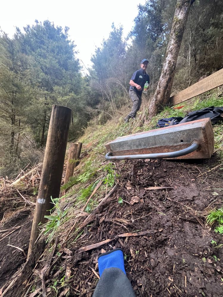 Another trail volunteer and maintenance coordinator hydrating before we return to pounding those wooden posts into the earth with that two man metal post pounder. Hard work!