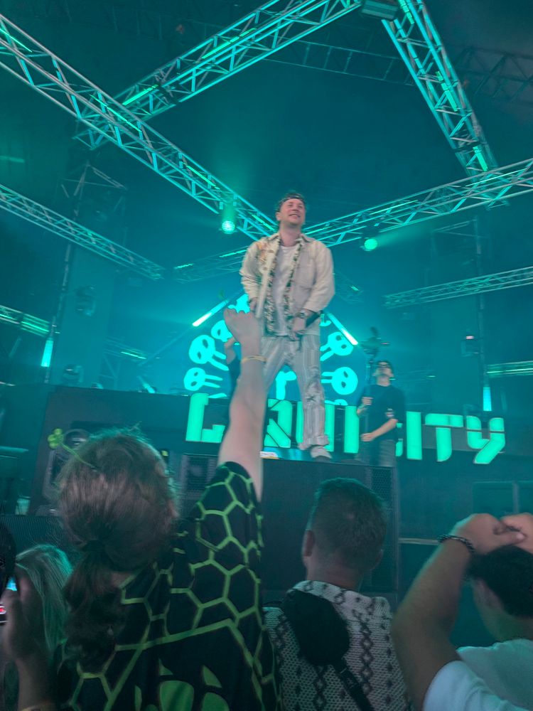 Fox Stevenson standing again on the stage ontop a black box.