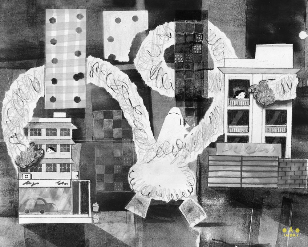 a giant creature twists its arms to reach two houses across a city 