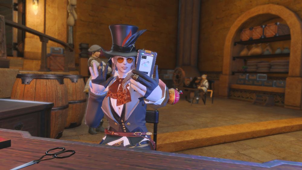 Aerstwyb taking a selfie at the Weaver's Guild workshop while the apprentices are busy working. Redolent Rose puts up with it because she's his most sharp dressed tailor.