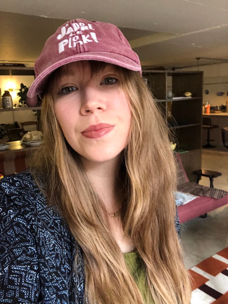 a picture of me in the j’adore le plonk cap 
