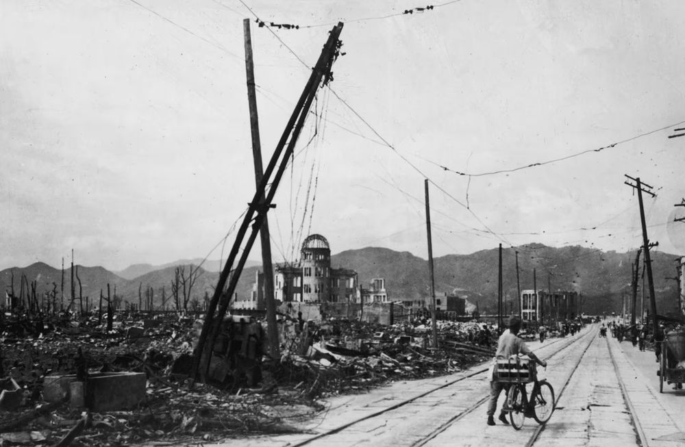 Black and white photo of the ruins of Hiroshima after the US dropped a nuclear bomb on it
