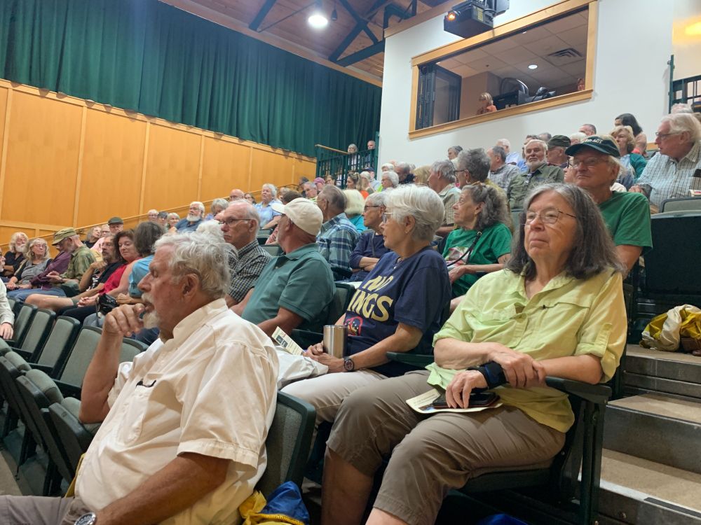 An audience of elders listening to Bill McKibben's talk.