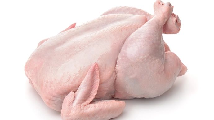 A whole raw chicken 
