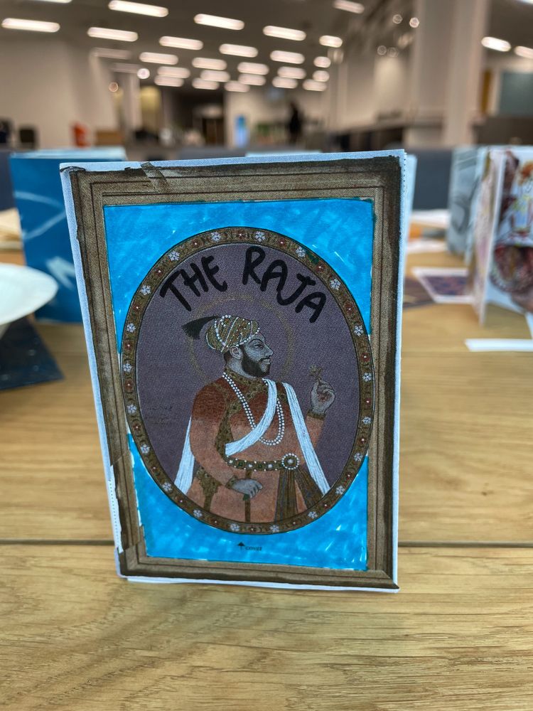 A zine with the image of a South Asian man titled The Raja
