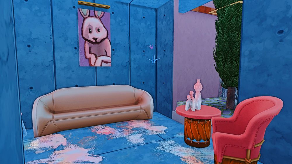 a blue living room with an atrium and pink furniture